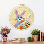 Finished happy rabbit harvest artwork displayed on a wall
