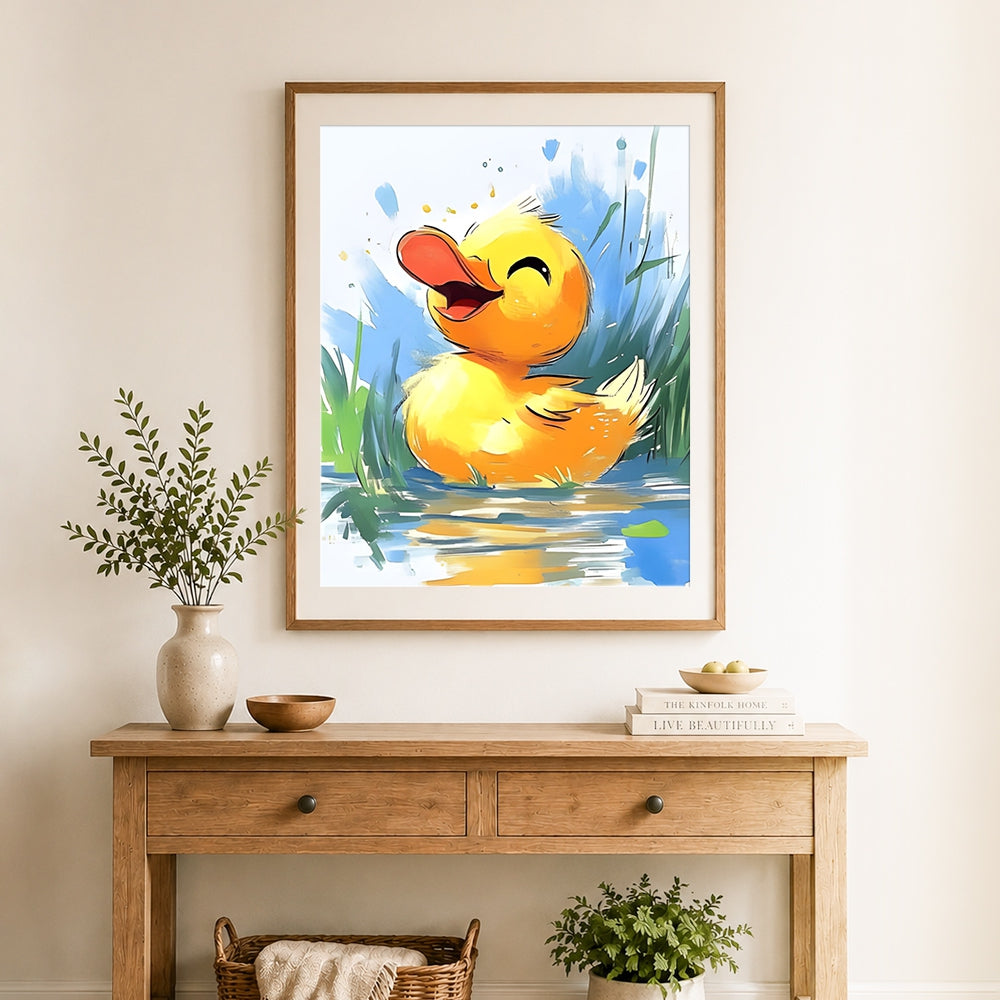 Finished happy yellow duckling cross stitch artwork displayed as home decor