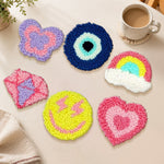 Heart, rainbow and smiley punch needle coasters used for home decoration