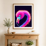 Finished heart shape flamingo cross stitch artwork displayed as home decor