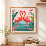 Finished heart‑shaped flamingo couple cross stitch artwork displayed as home decor