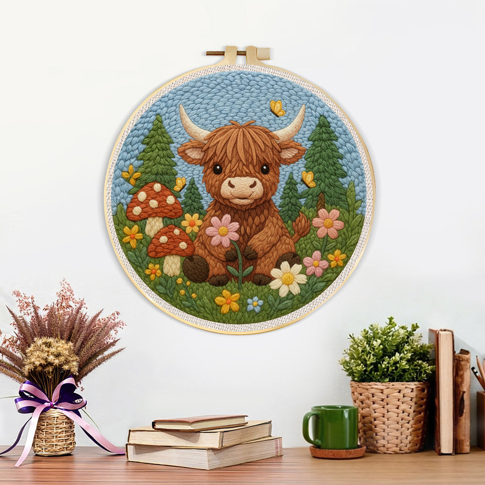 Finished highland cow and mushrooms in spring artwork displayed on a wall