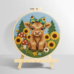 Highland cow and sunflowers on the green grass punch needle kit for beginners