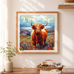 Finished highland cow in flower valley cross stitch artwork displayed as home decor
