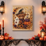 Finished highland cow with ghost and pumpkins pearl diamond painting artwork displayed as holiday home decor