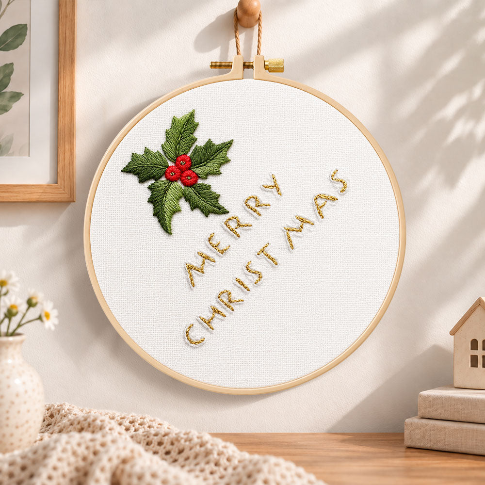 Holly and merry christmas embroidery hoop wall art displayed as warm and cozy handmade home decor