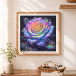 Finished holographic rainbow rose on dark background cross stitch artwork displayed as home decor
