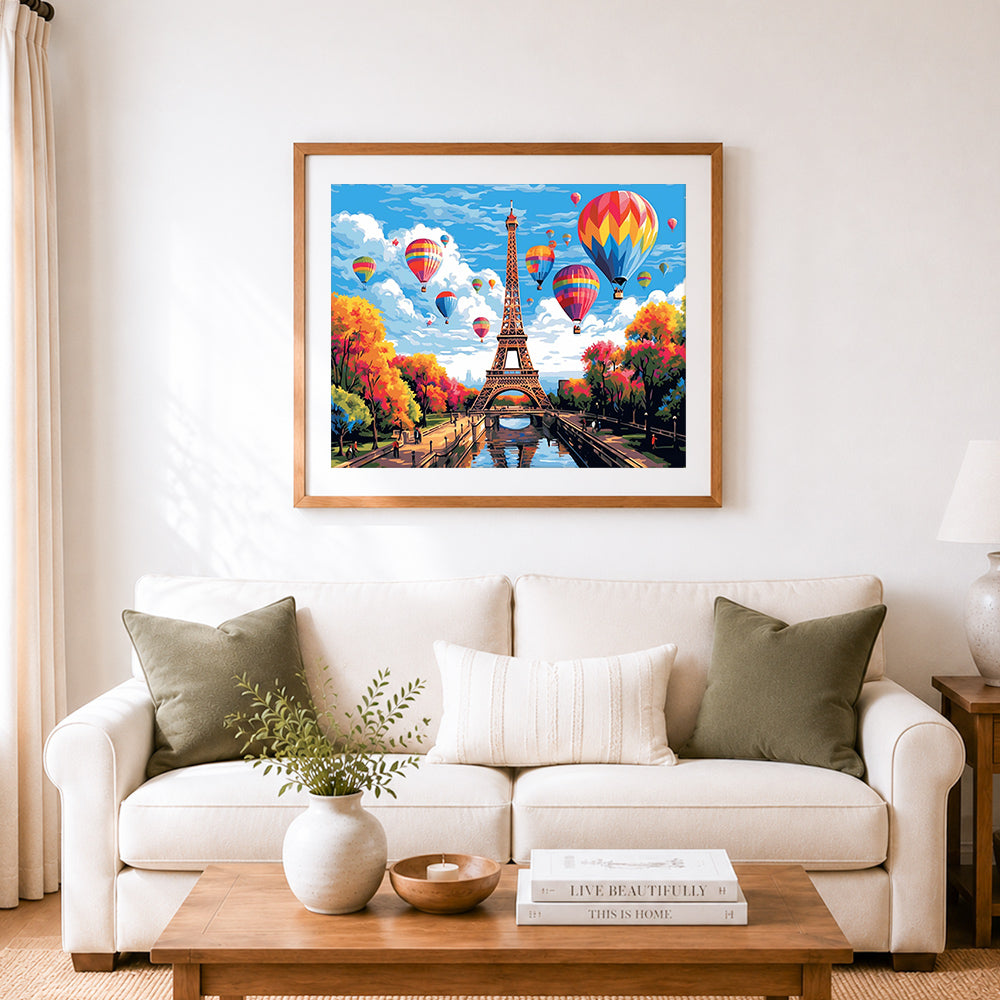 Finished hot air balloons over paris cross stitch artwork displayed as home decor