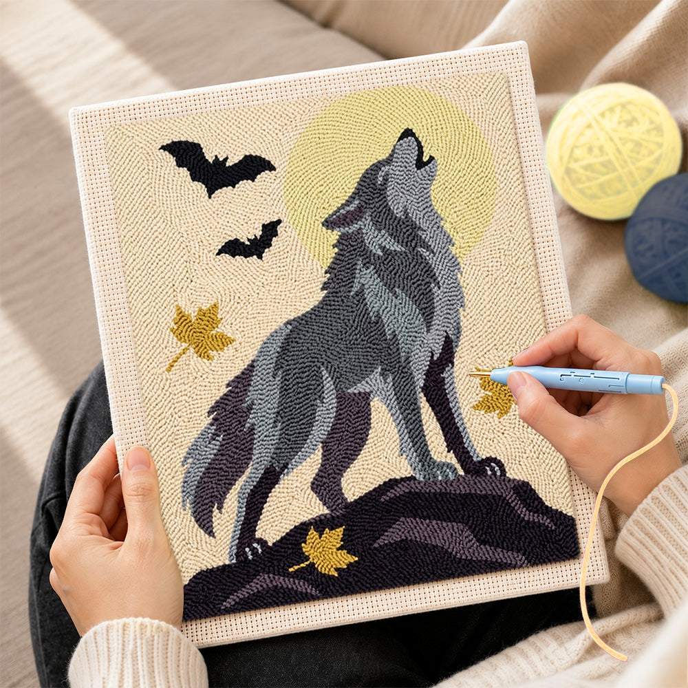 Creating handmade howling wolf under full moon punch needle artwork