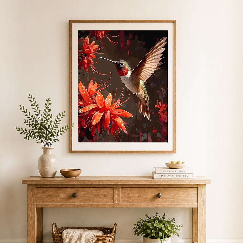 Finished hummingbird with red blooms cross stitch artwork displayed as home decor