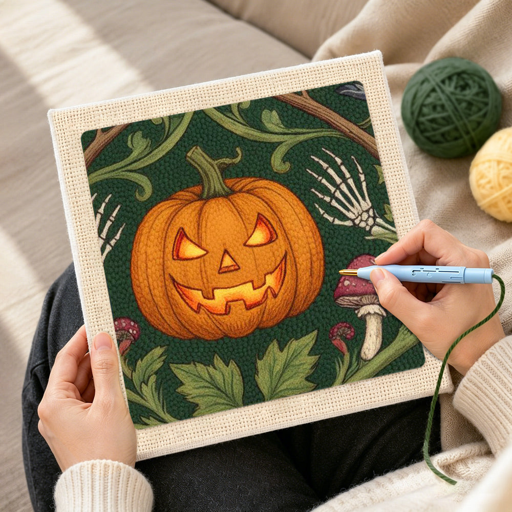 Creating handmade illuminated halloween pumpkin punch needle artwork