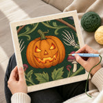 Creating handmade illuminated halloween pumpkin punch needle artwork