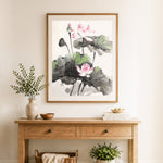 Finished ink wash lotus art cross stitch artwork displayed as home decor