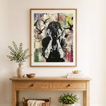 Finished inner turmoil cross stitch artwork displayed as home decor