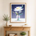 Finished iridescent white bloom cross stitch artwork displayed as home decor