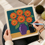 Creating handmade jack‑o‑lantern blooms punch needle artwork