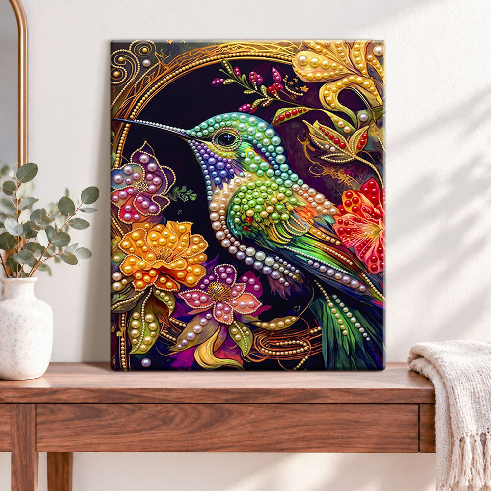 Finished jeweled hummingbird pearl diamond painting artwork displayed as home decor