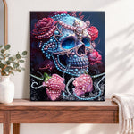 Finished jeweled skull and roses pearl diamond painting artwork displayed as home decor