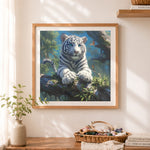 Finished jungle white tiger cub cross stitch artwork displayed as home decor