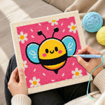 Creating handmade kawaii blue-winged bee punch needle artwork