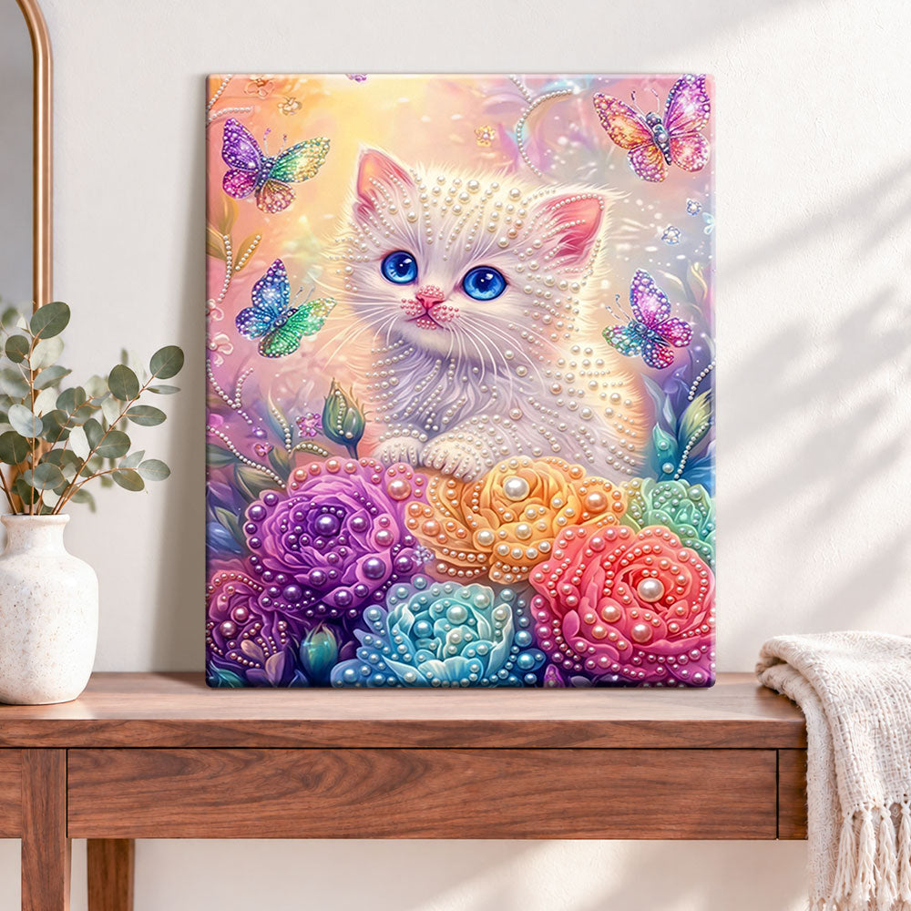 Finished kitten and rainbow butterflies pearl diamond painting artwork displayed as home decor