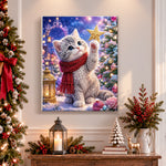 Finished kitten holding golden star pearl diamond painting artwork displayed as holiday home decor