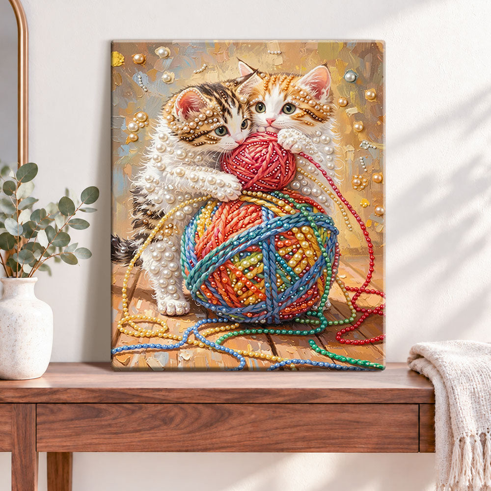 Finished kittens and yarn fun pearl diamond painting artwork displayed as home decor