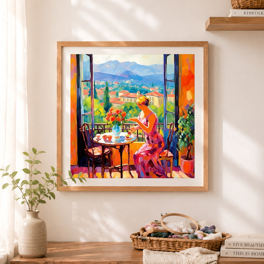 Finished lady enjoying mountain view cross stitch artwork displayed as home decor
