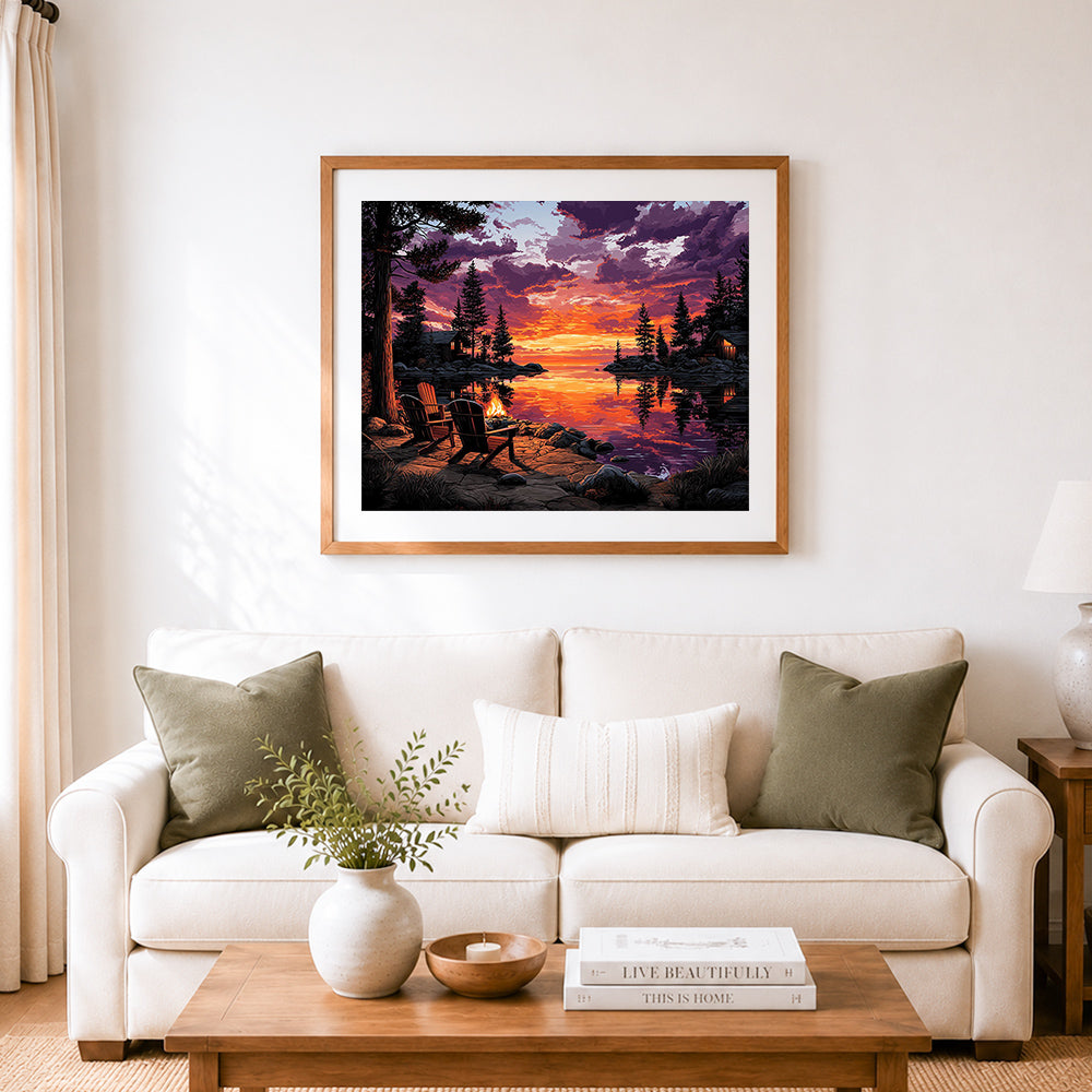 Finished lakeside sunset campfire with chairs cross stitch artwork displayed as home decor