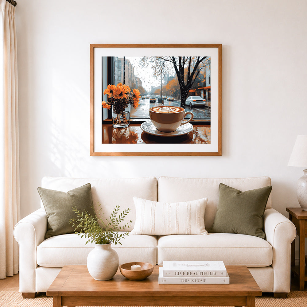 Finished latte by rainy city window cross stitch artwork displayed as home decor