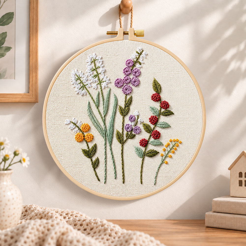Lavender wildflower embroidery hoop wall art displayed as warm and cozy handmade home decor