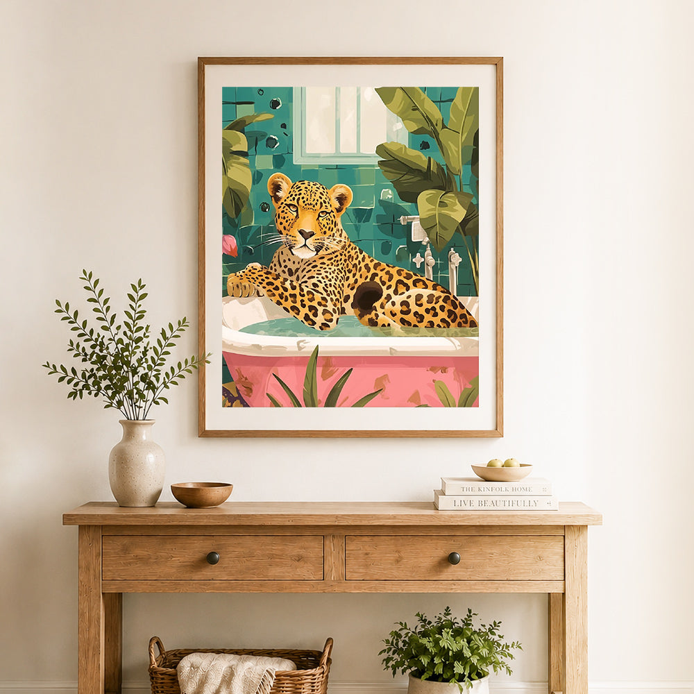 Finished leopard in bathtub cross stitch artwork displayed as home decor