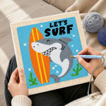 Creating handmade "LET'S SURF" shark with surfboard punch needle artwork