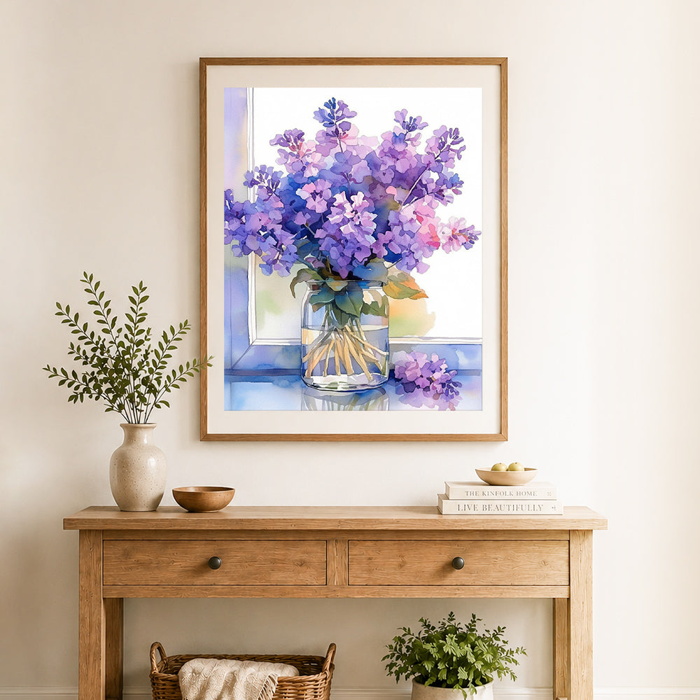 Finished lilac in glass jar cross stitch artwork displayed as home decor