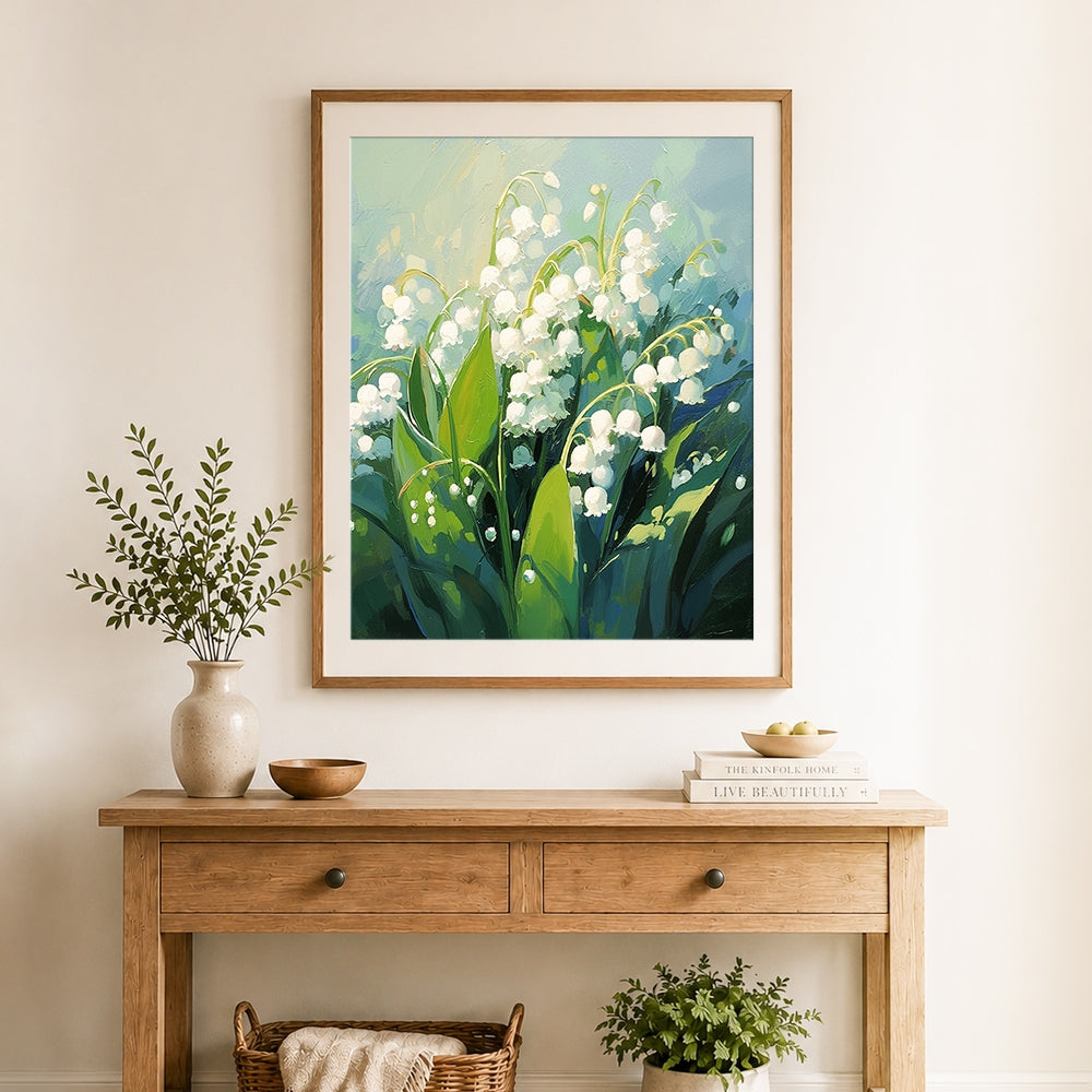 Finished lily of the valley flowers cross stitch artwork displayed as home decor