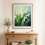 Finished lily of the valley flowers cross stitch artwork displayed as home decor
