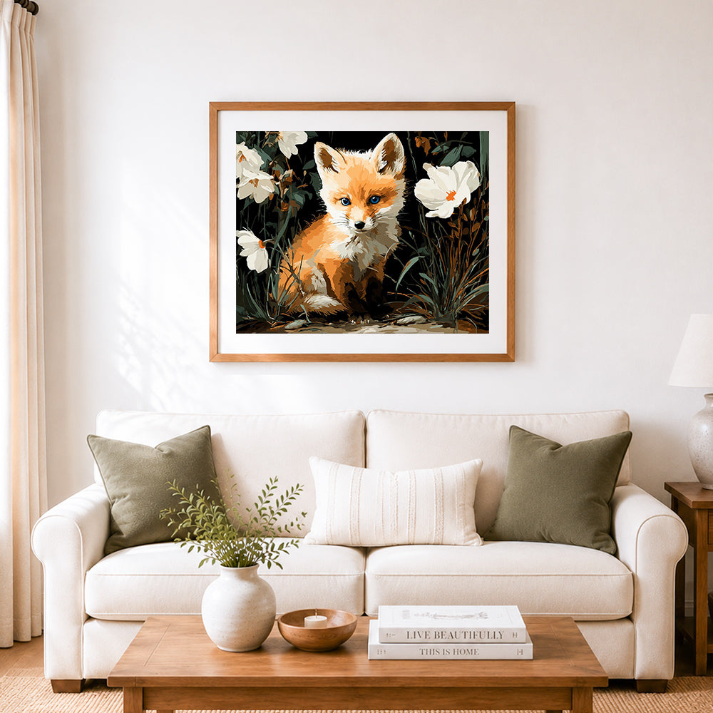 Finished little fox cub among white wildflowers cross stitch artwork displayed as home decor
