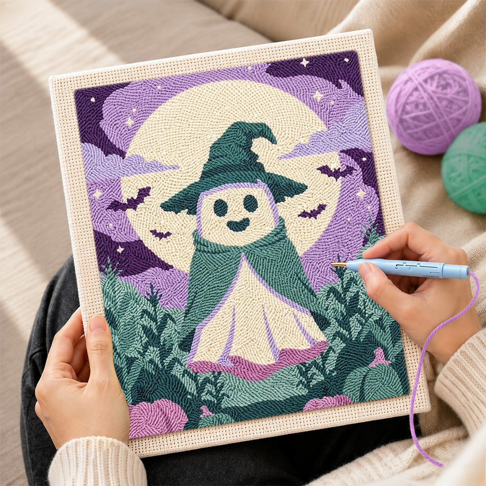 Creating handmade little ghost witch under full moon punch needle artwork