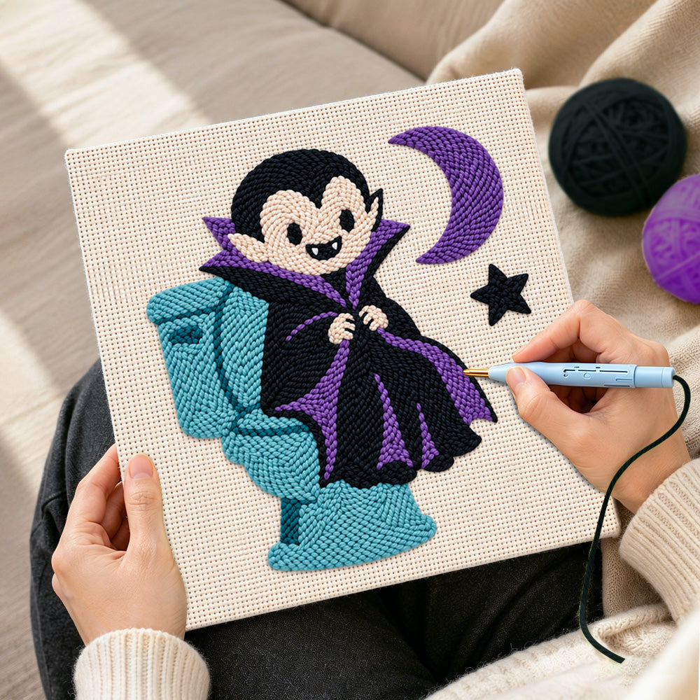 Creating handmade little vampire on toilet punch needle artwork