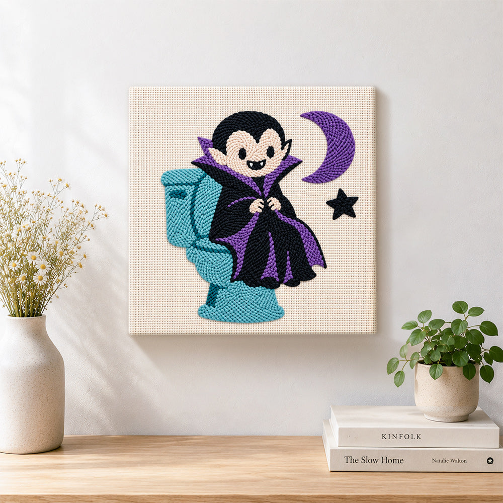 Finished little vampire on toilet artwork displayed on a wall
