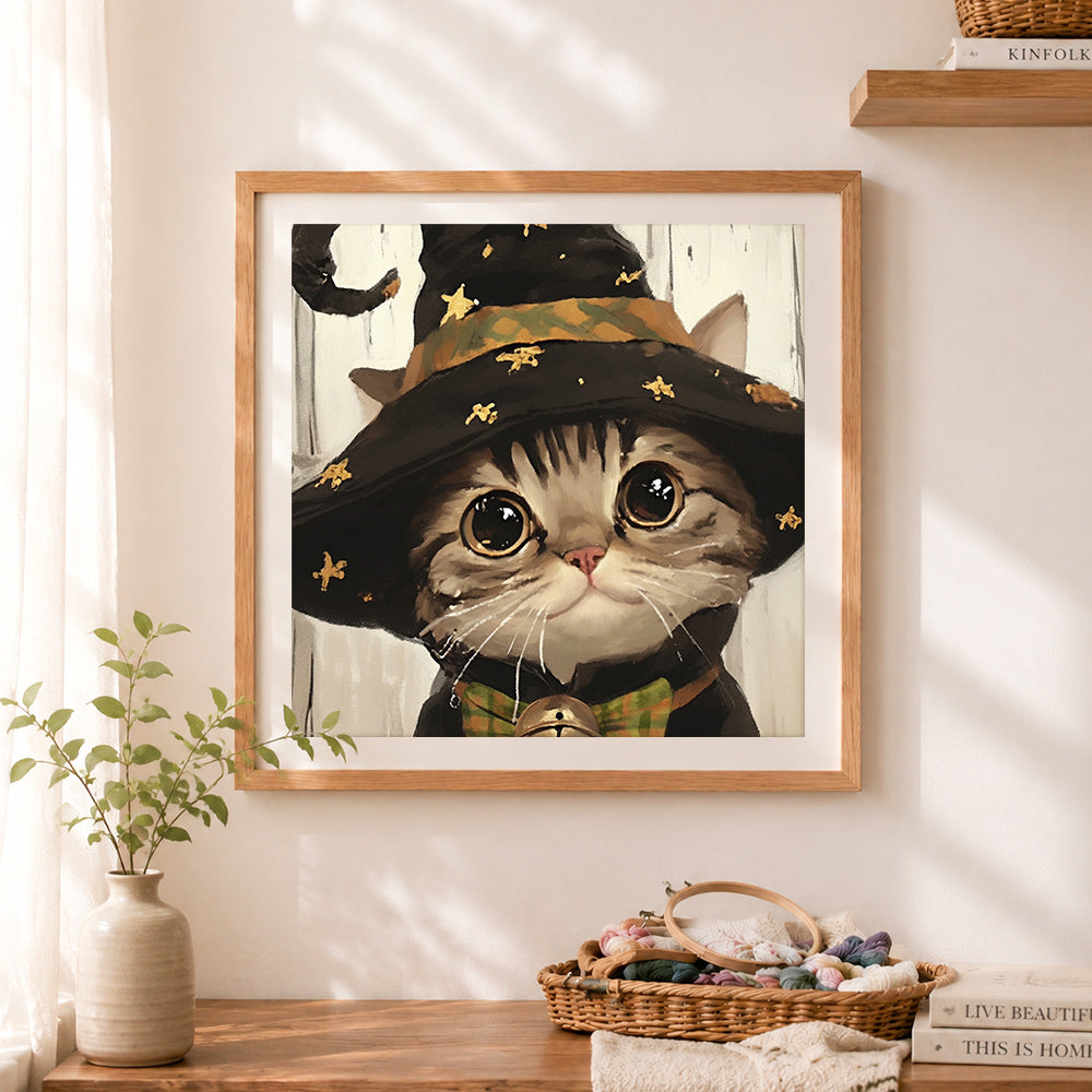 Finished little witch cat cross stitch artwork displayed as home decor