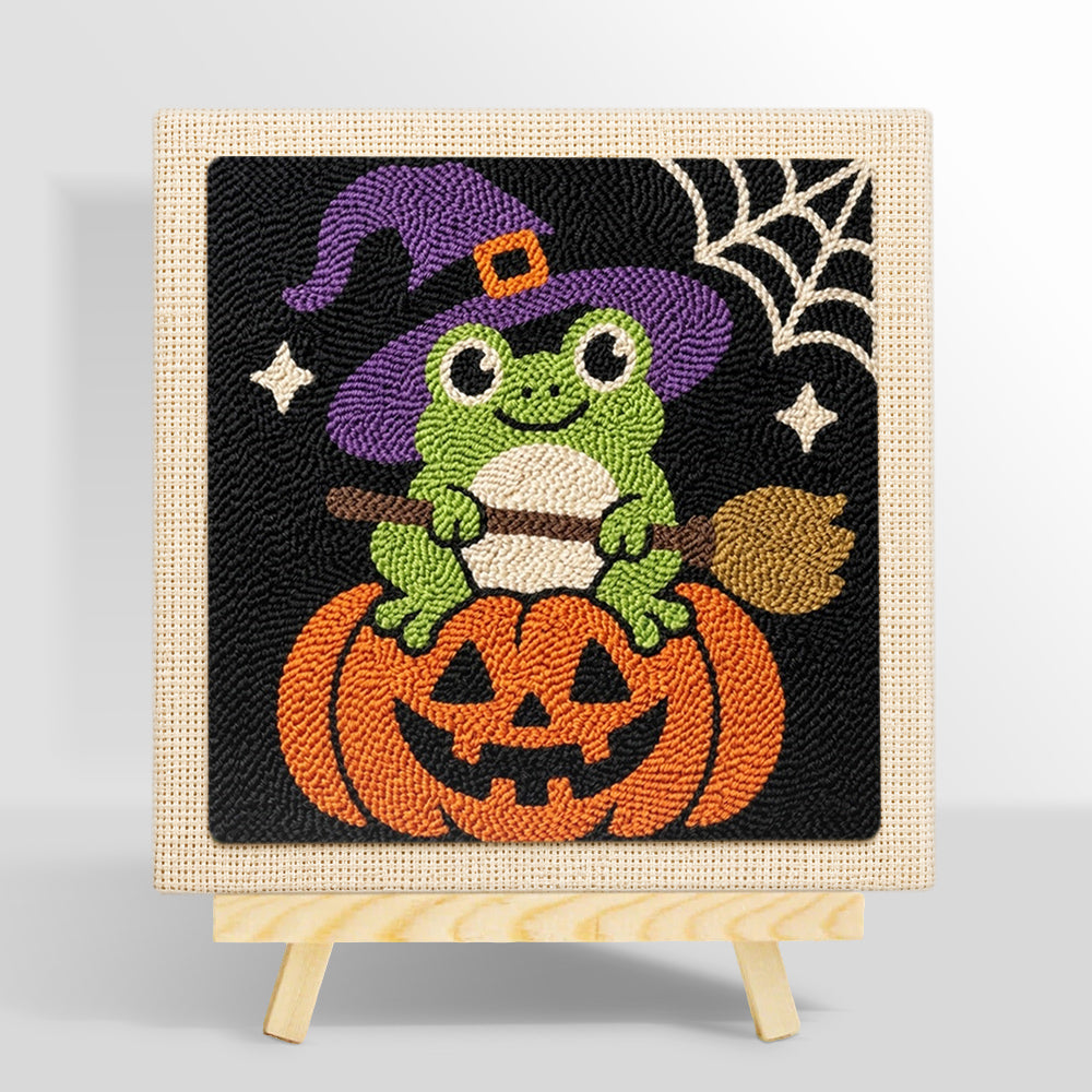 Little witch frog sitting on pumpkin punch needle kit for beginners