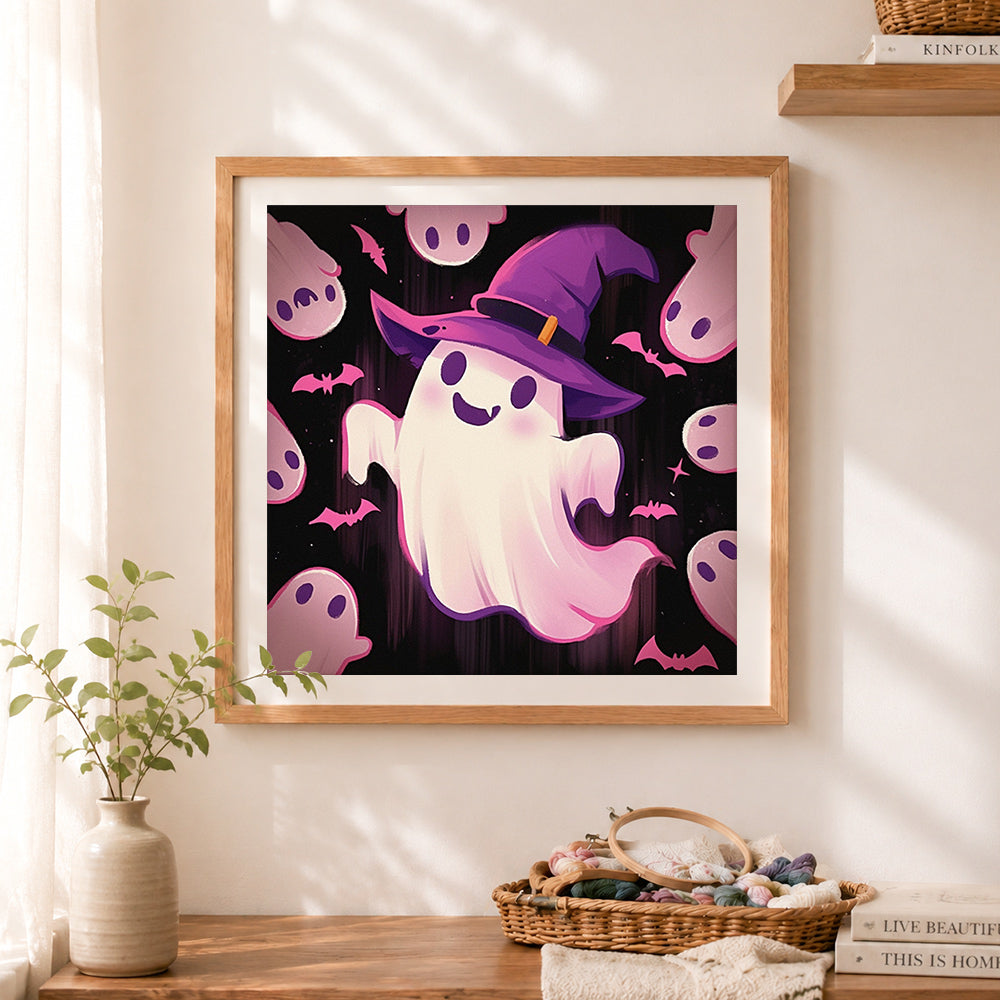 Finished little witch ghost cross stitch artwork displayed as home decor