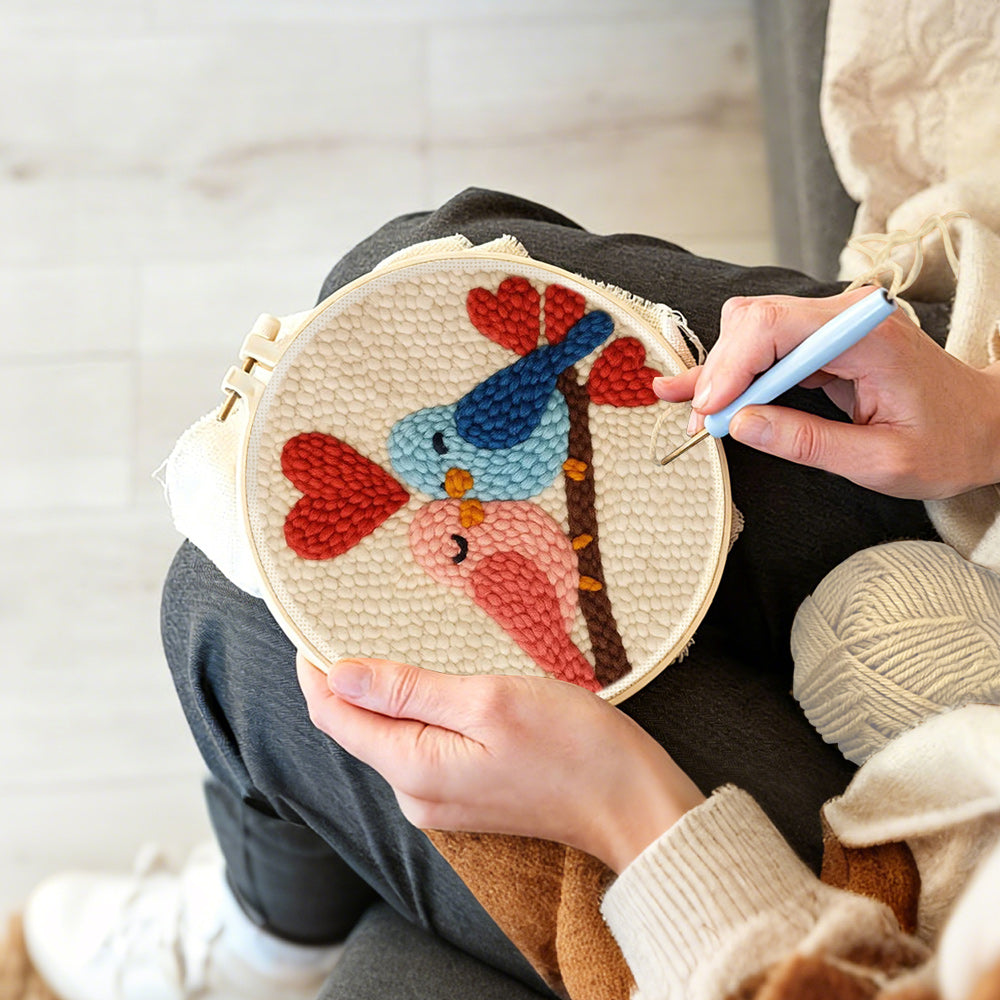 Creating handmade lovebirds and hearts punch needle artwork