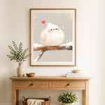 Finished lovely bird with little heart cross stitch artwork displayed as home decor