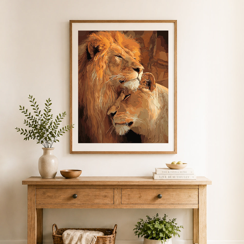 Finished loving lion couple cross stitch artwork displayed as home decor