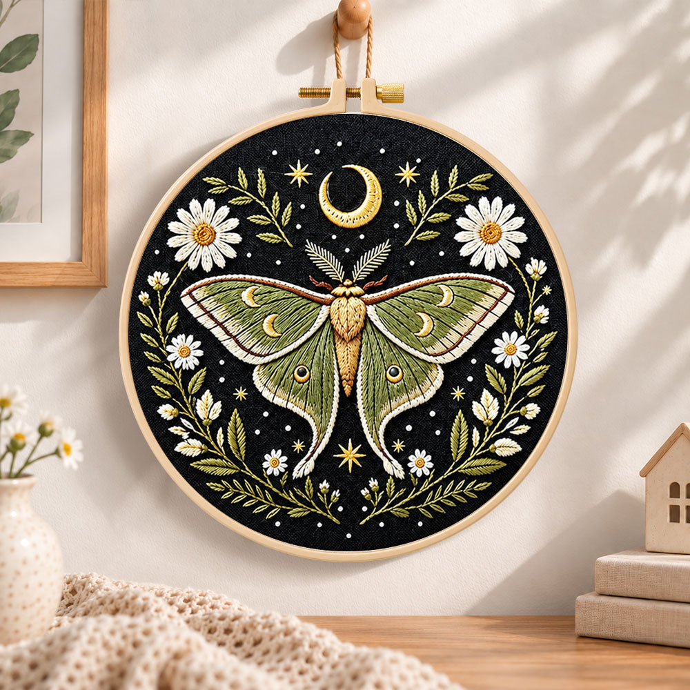 Luna moth and crescent moon embroidery hoop wall art displayed as warm and cozy handmade home decor