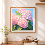 Finished lush pink hydrangeas cross stitch artwork displayed as home decor