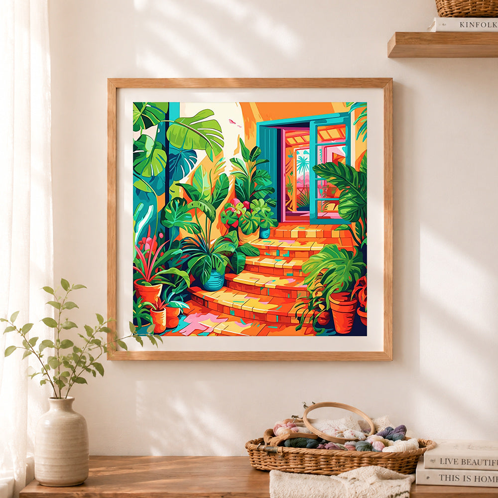 Finished lush tropical home entry cross stitch artwork displayed as home decor