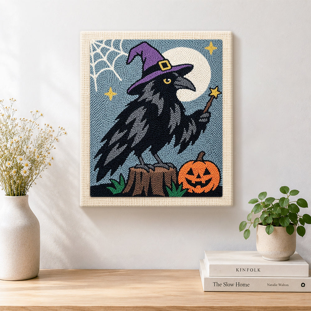 Finished magic crow with witch hat artwork displayed on a wall